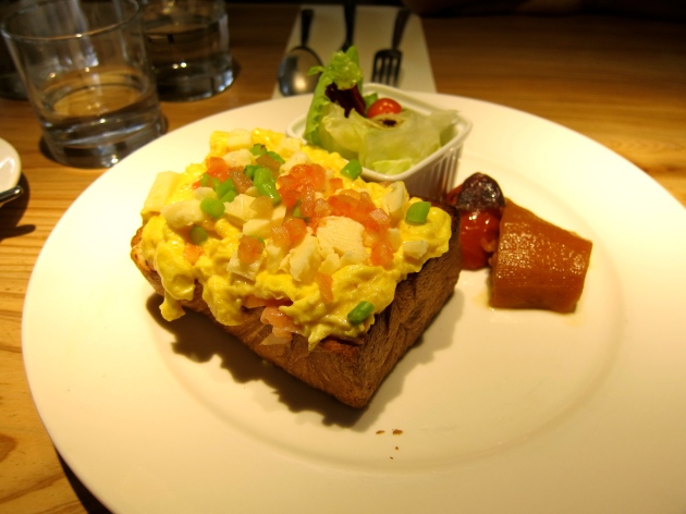 Cheese and smoked salmon danish toast topped with scrambled eggs